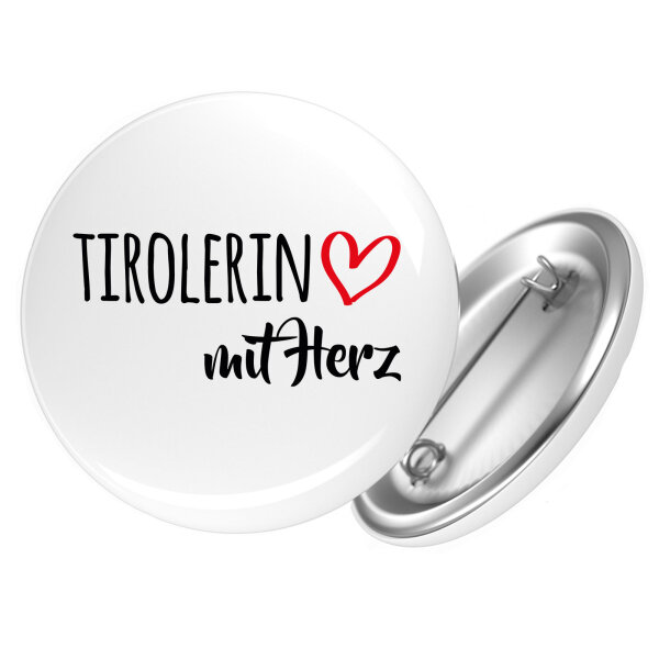 Button Tirolerin mit Herz